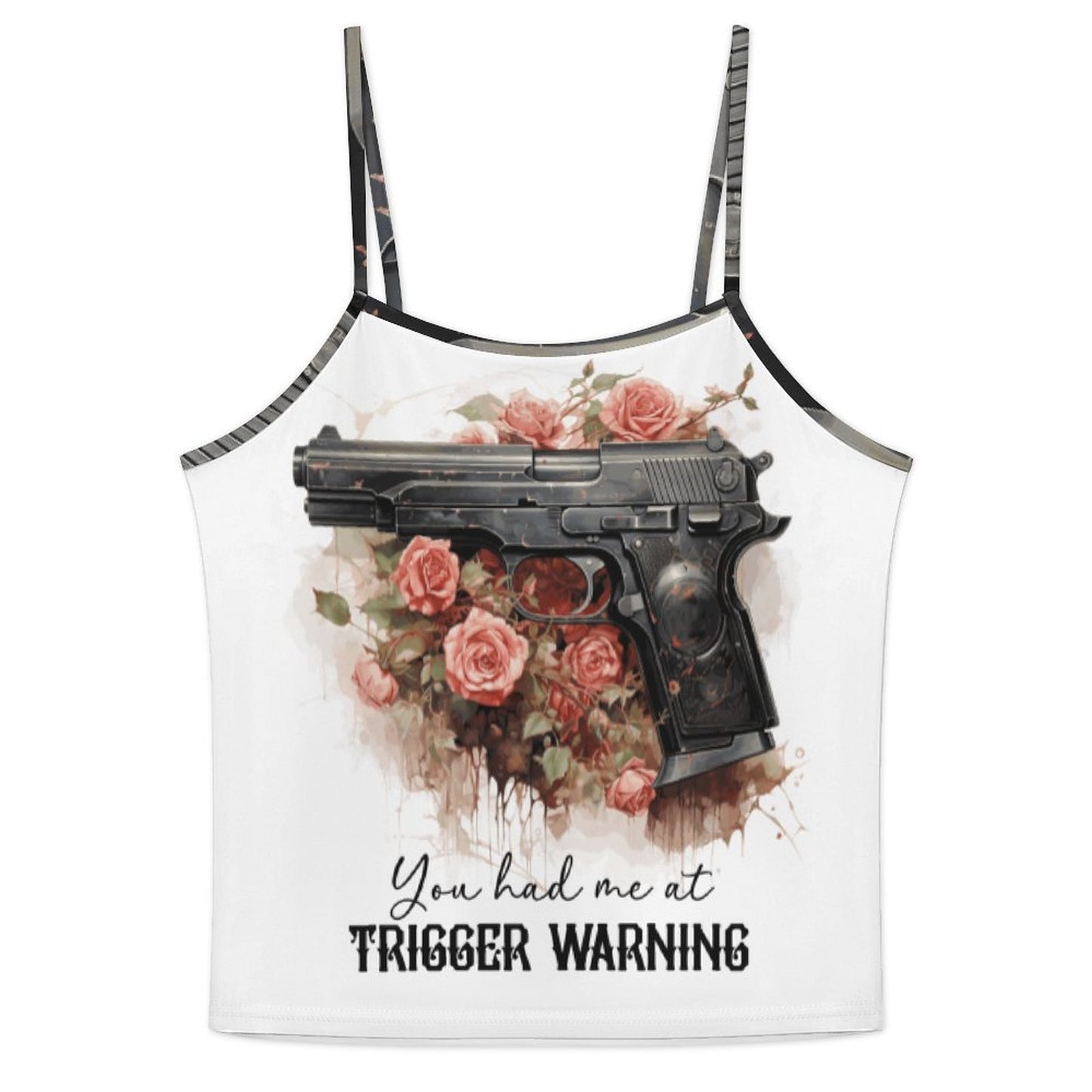 Close-up view of the white ice silk camisole top from the Trigger Warning pajama set. Features a dark romance illustration of a black handgun tucked into pink roses with the gothic text 'You had me at TRIGGER WARNING'.