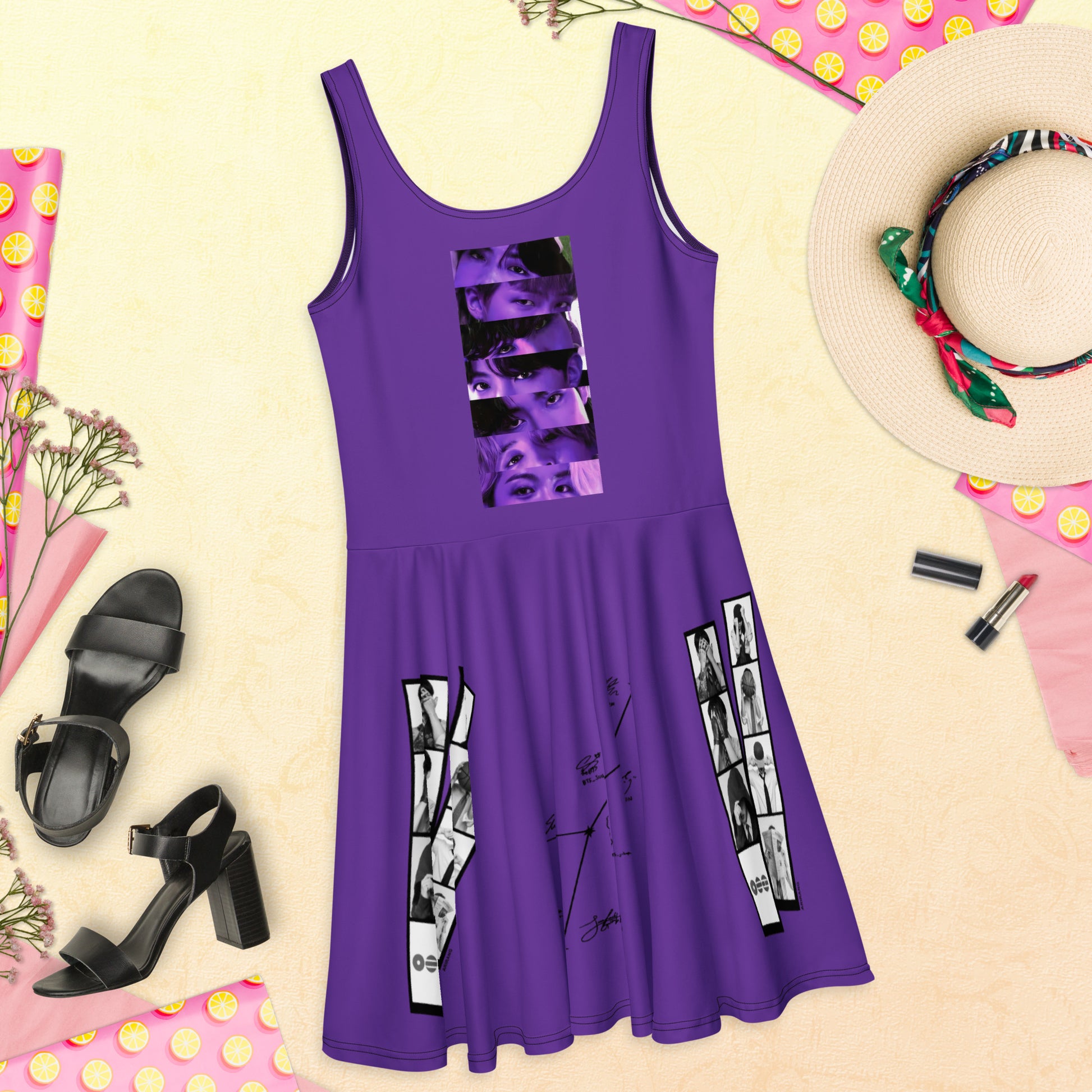 Flat lay view of the back of the purple BTS Arirang World Tour 2026 skater dress styled with black heels and a straw hat.