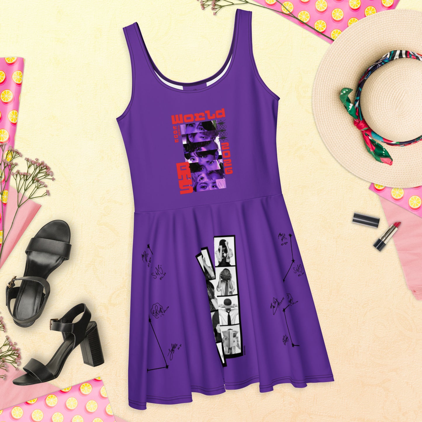 PFlat lay view of the purple BTS Arirang World Tour 2026 skater dress styled on a summer backdrop with black heels and a straw hat.