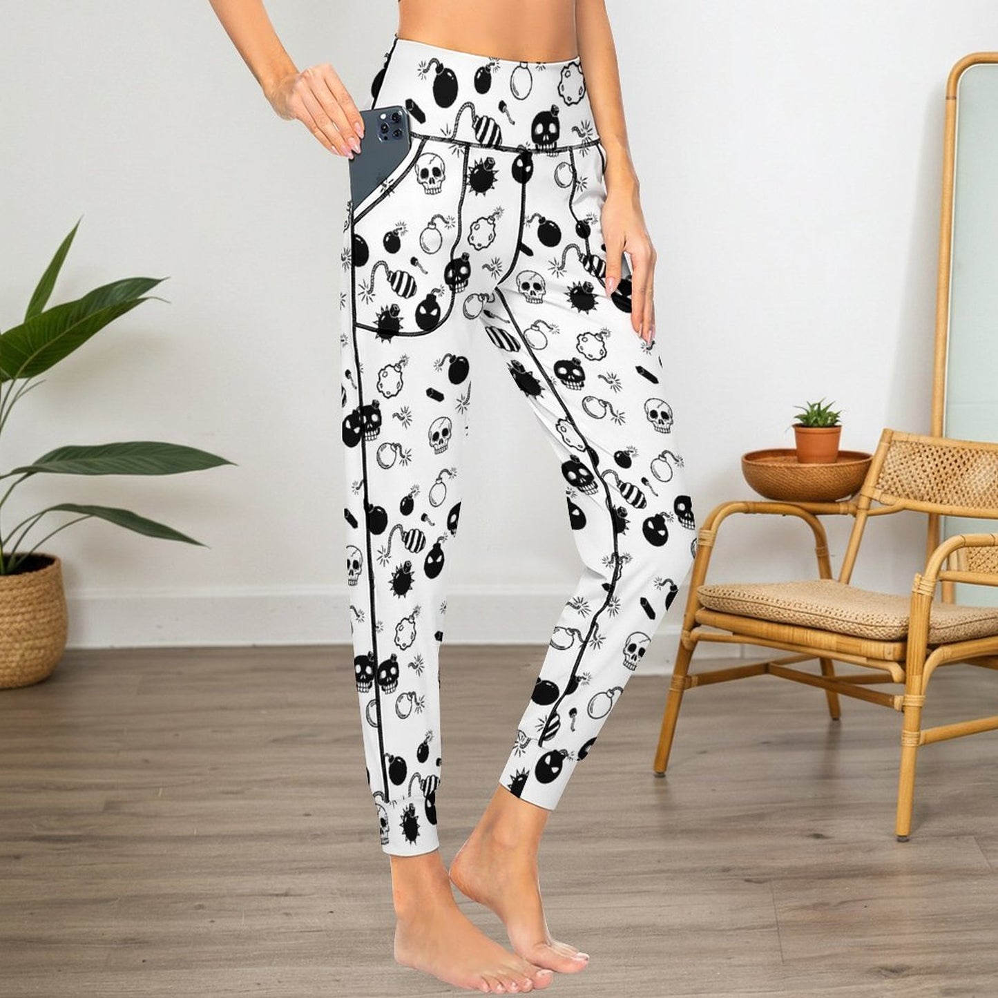Side view detail of the premium 180gsm Milk Silk joggers, highlighting the integrated side pockets and the tapered leg cuff design.