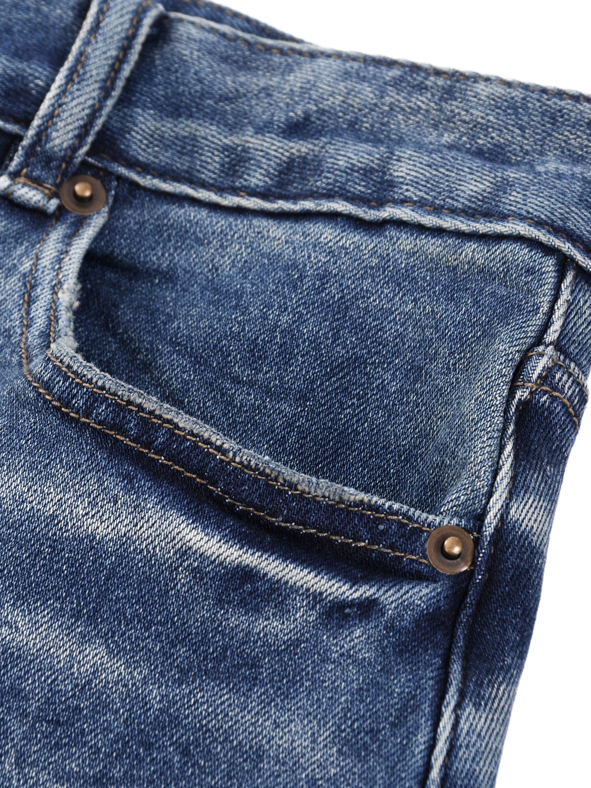 Close-up view of the front pocket construction, metal rivets, and sun-faded wash detailing on the BT21 King TATA denim jeans.