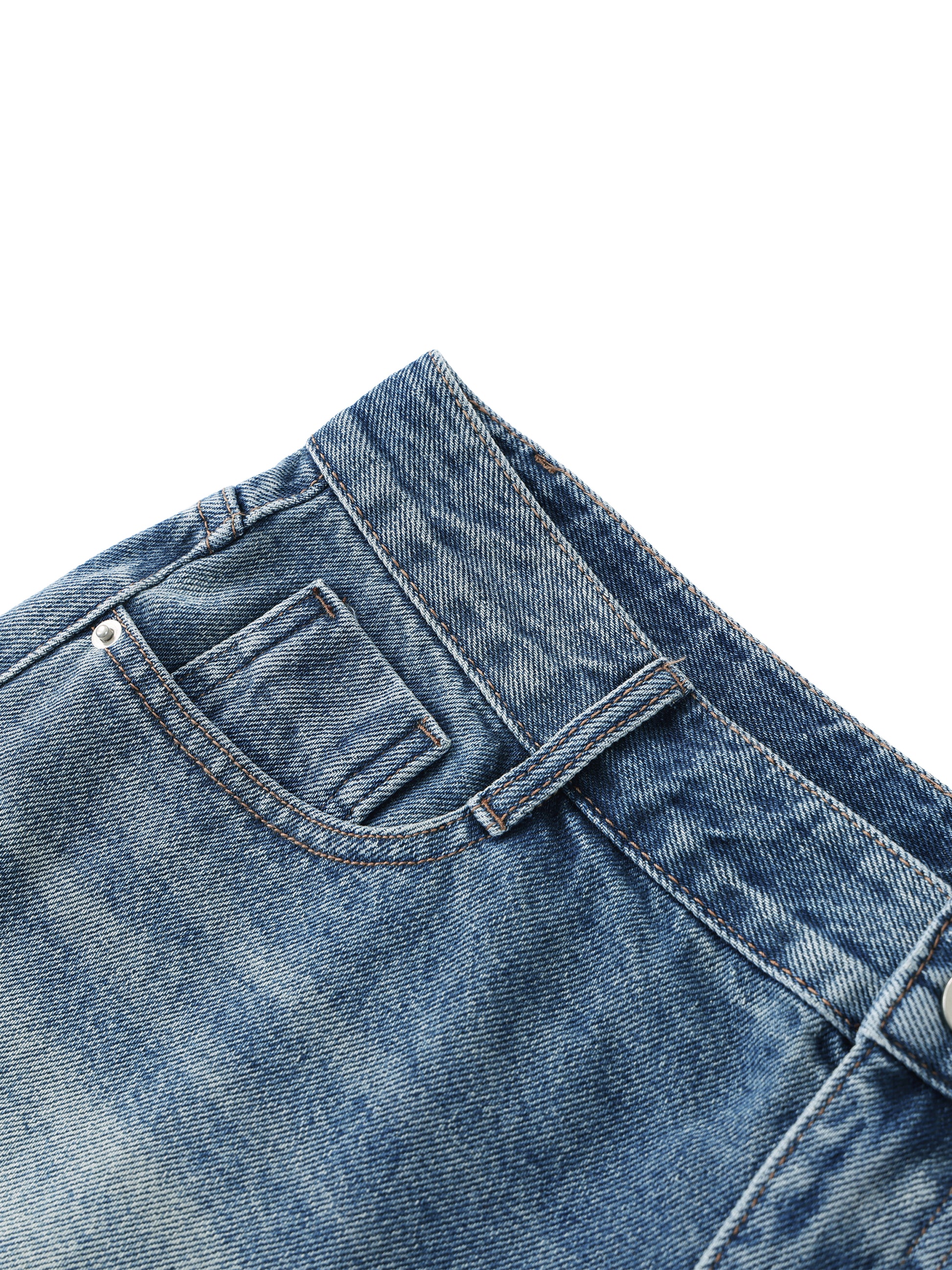 Close-up view of the front coin pocket, metal rivets, and double-stitching details on premium blue vintage wash raw hem denim shorts.