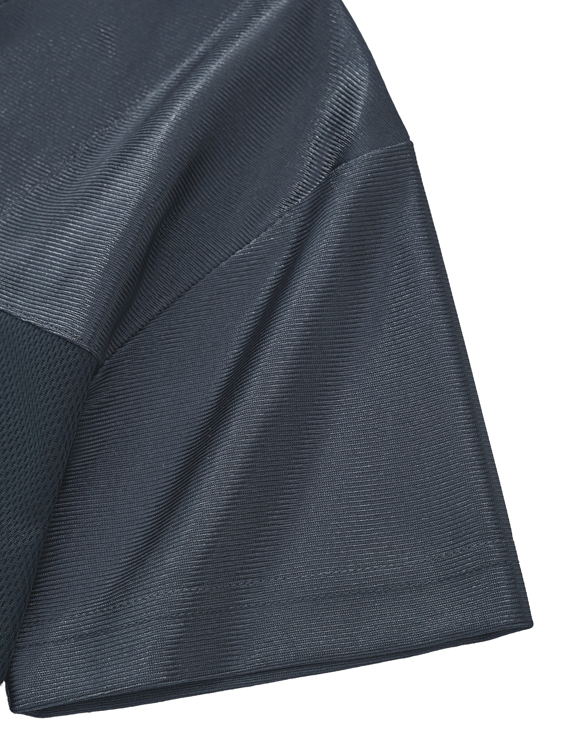 Macro close-up view of the dark gray short sleeve on the BTS V cropped jersey, showcasing the detailed double-stitching layout and premium fabric texture.