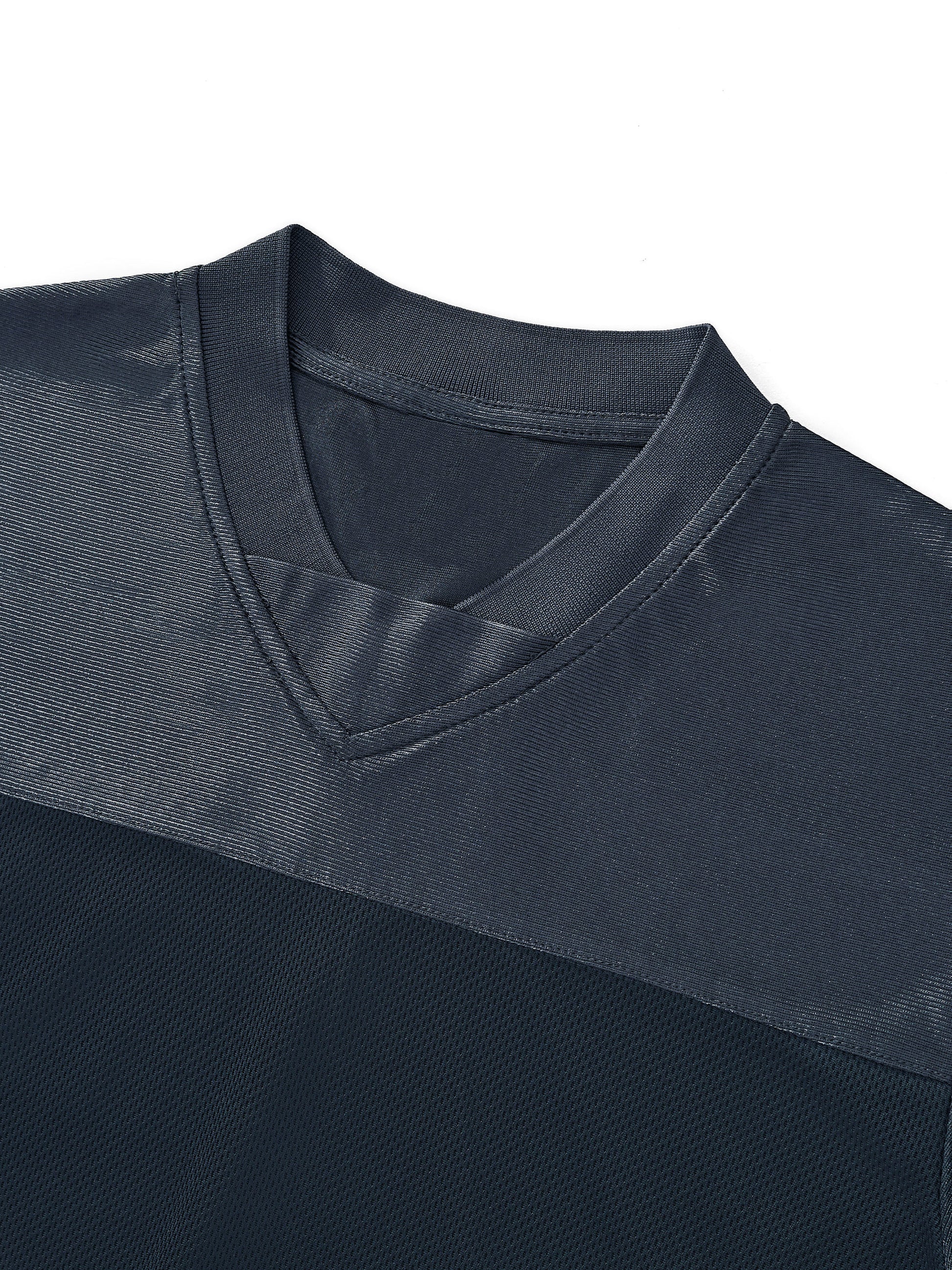 Macro close-up view of the dark purple mesh patchwork fabric and ribbed V-neckline on the BTS V cropped jersey, highlighting the breathable hollow-out texture.