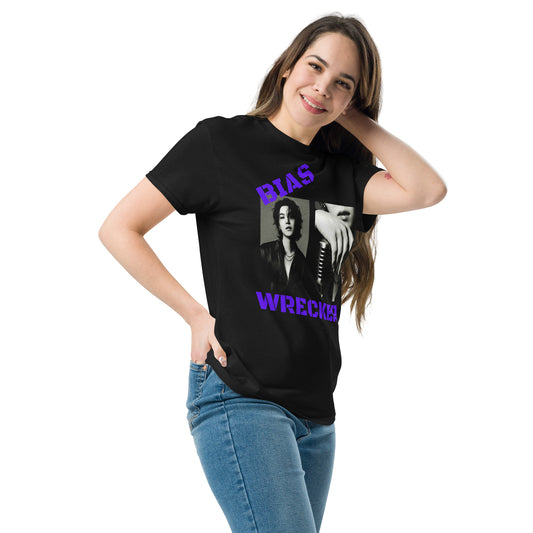 Model wearing a black "Bias Wrecker" BTS graphic t-shirt and blue jeans, featuring a purple typographic design and grayscale artist photos.